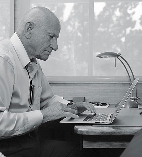 Dr. Edwin K. Yager working at his computer